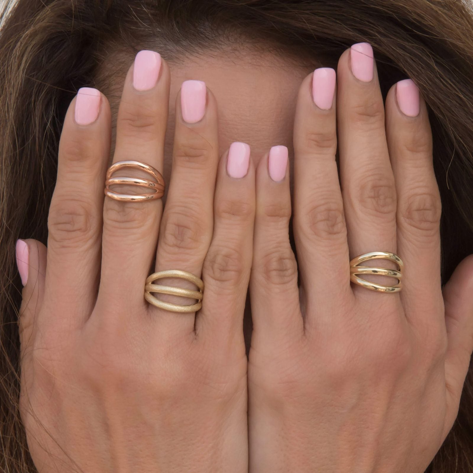 triple_open_ring_gold